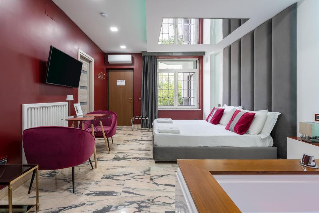 Postel nebo postele na pokoji v ubytování Hotel Ibisco Suites & Relax
