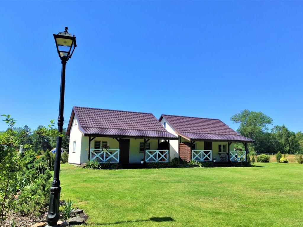Vonkajšia záhrada v ubytovaní Resort in Kolczewo near West Pomerania Lakes