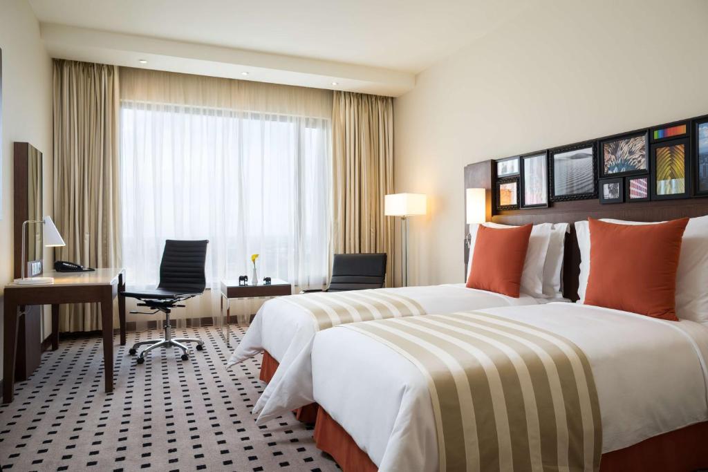 Postel nebo postele na pokoji v ubytování Radisson Blu Hotel, Nairobi Upper Hill