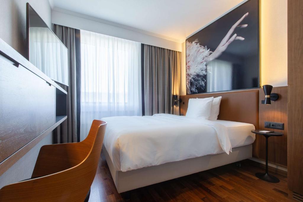 Voodi või voodid majutusasutuse Radisson Blu, Basel toas
