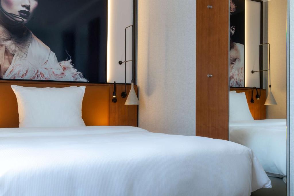 Voodi või voodid majutusasutuse Radisson Blu, Basel toas
