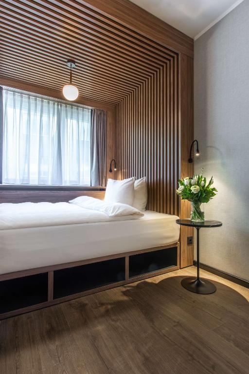 Voodi või voodid majutusasutuse Radisson Blu, Basel toas
