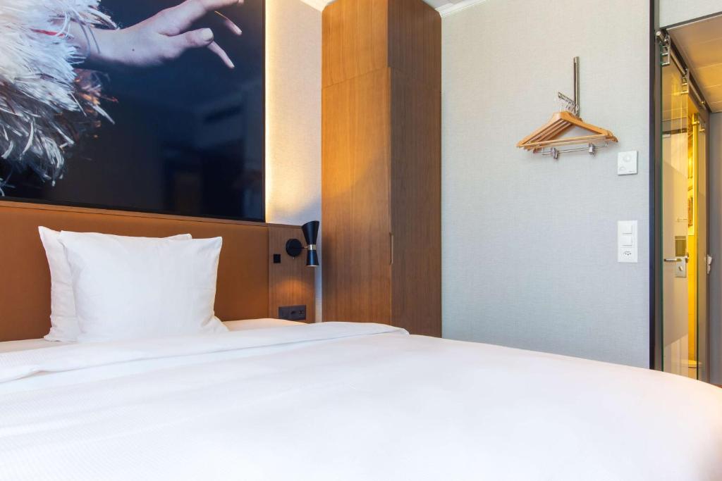 Voodi või voodid majutusasutuse Radisson Blu, Basel toas