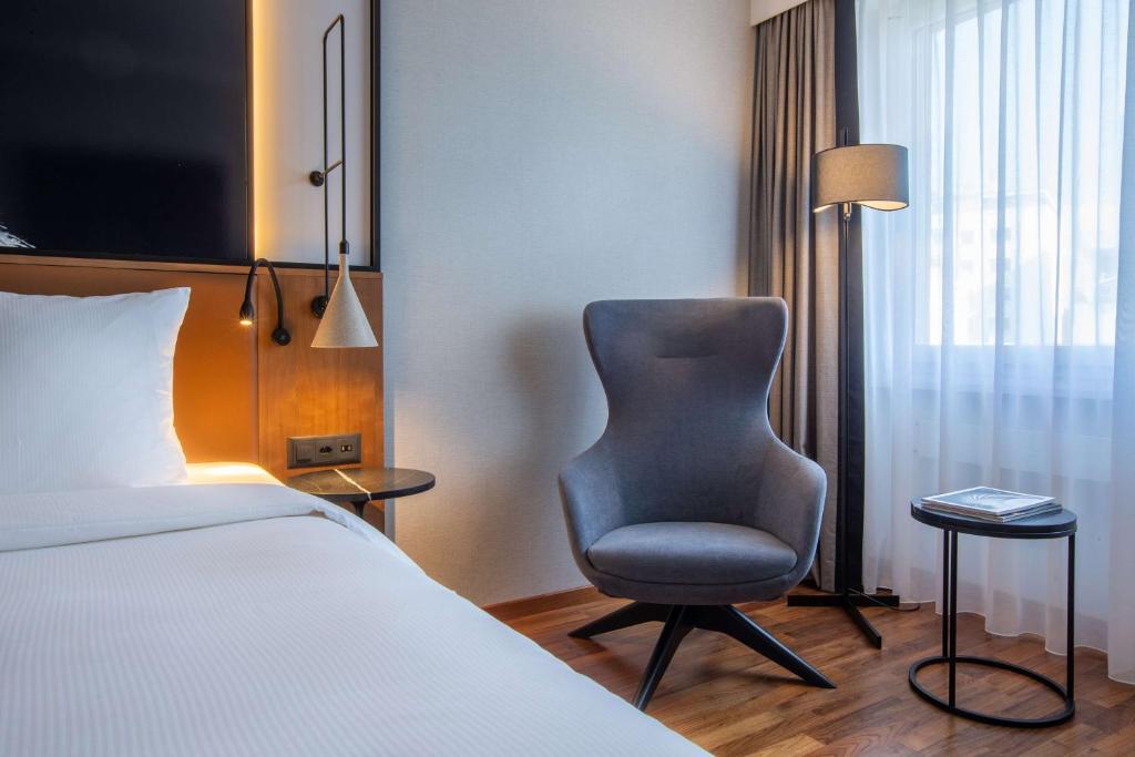 Voodi või voodid majutusasutuse Radisson Blu, Basel toas