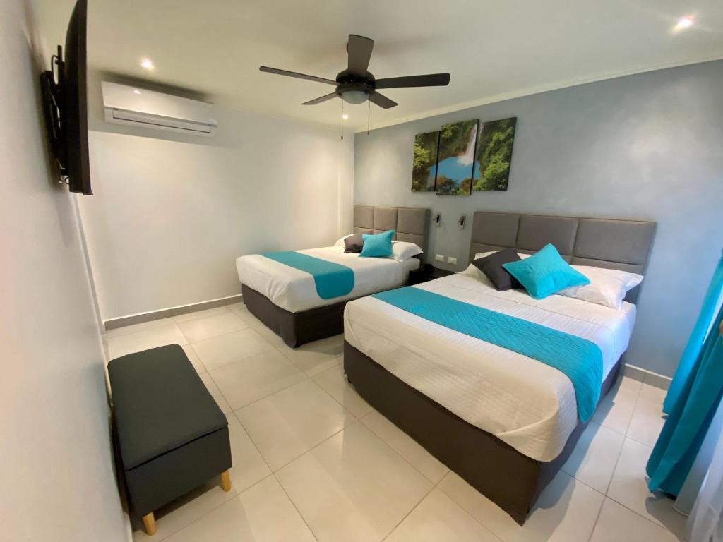 Кровать или кровати в номере Hotel Naoz