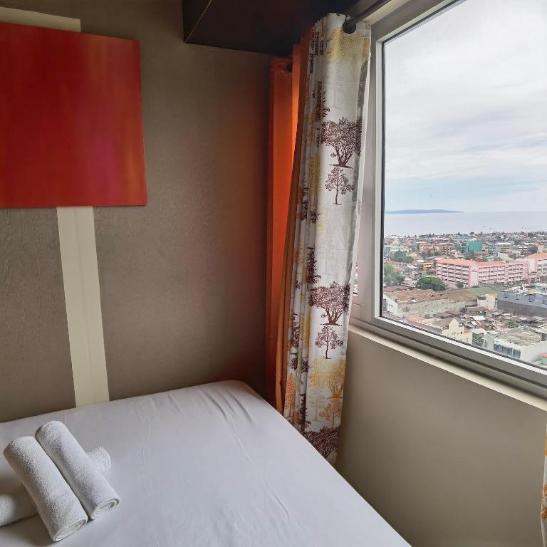 Avida Davao by davaobnb & Lemonique Homes - Triple Chambre Avec Vue Sur La Mer