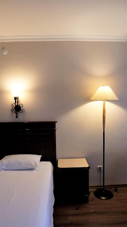 Postel nebo postele na pokoji v ubytování Montania Town Hotel Mudanya