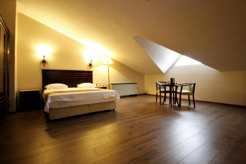 Postel nebo postele na pokoji v ubytování Montania Town Hotel Mudanya