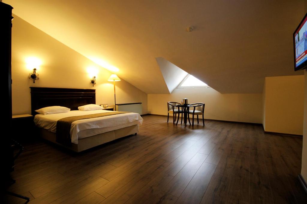Postel nebo postele na pokoji v ubytování Montania Town Hotel Mudanya