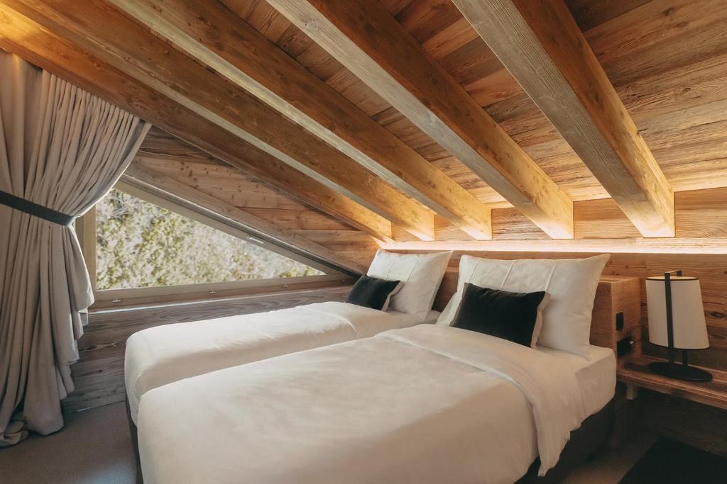 Postel nebo postele na pokoji v ubytování Eringer Hotel