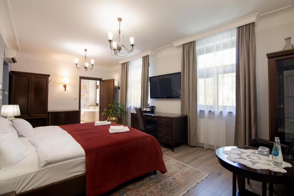 Postel nebo postele na pokoji v ubytování Hotel Ester