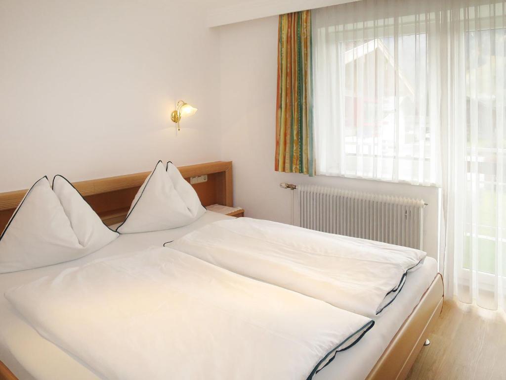 Postel nebo postele na pokoji v ubytování Apartment Weberbauer-1 by Interhome