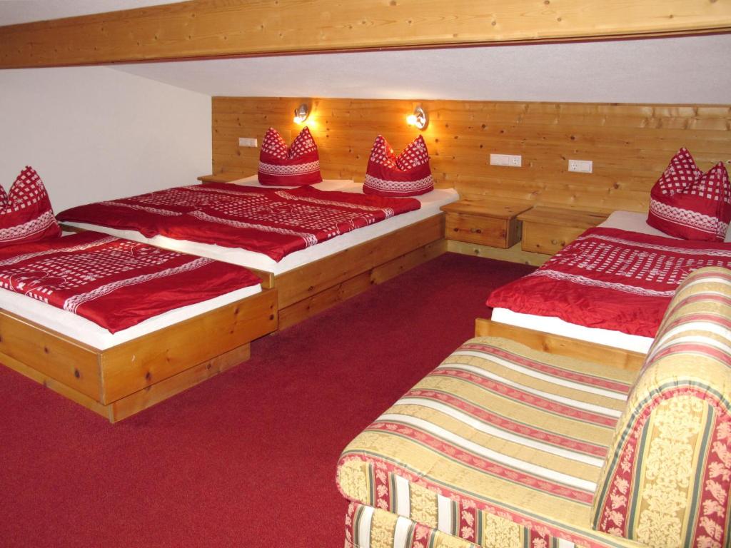 A bed or beds in a room at Apartment Gasthof Almluft-3 by Interhome