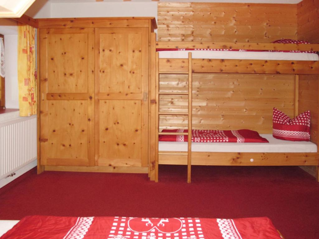 A bed or beds in a room at Apartment Gasthof Almluft-3 by Interhome