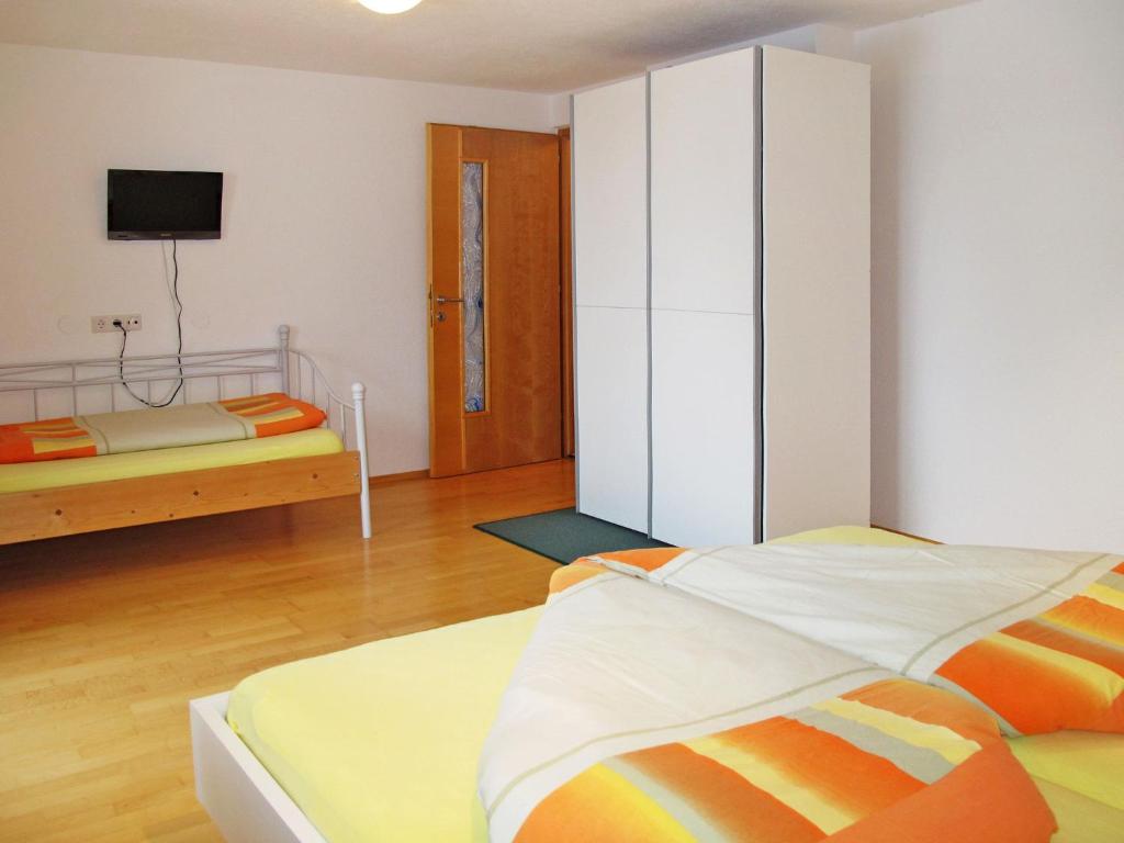Postel nebo postele na pokoji v ubytování Apartment Unterkreuter by Interhome