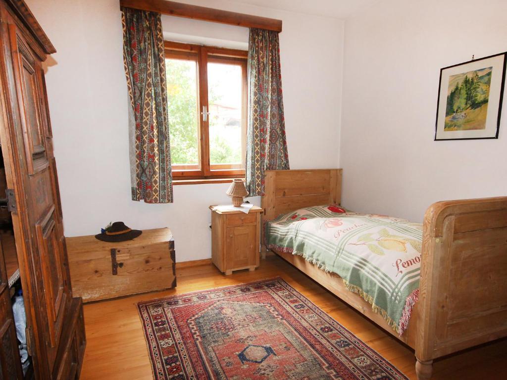 Posteľ alebo postele v izbe v ubytovaní Chalet Patricia by Interhome