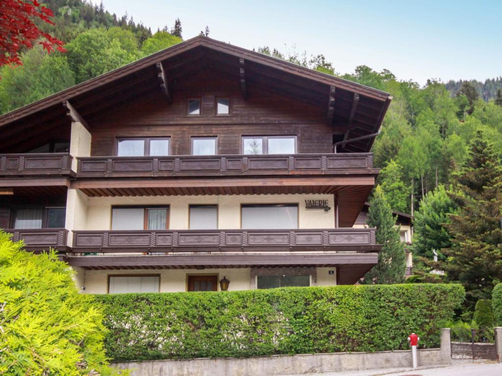 a large wooden building with a roof at Apartment Bella Vista by Interhome in Bad Hofgastein