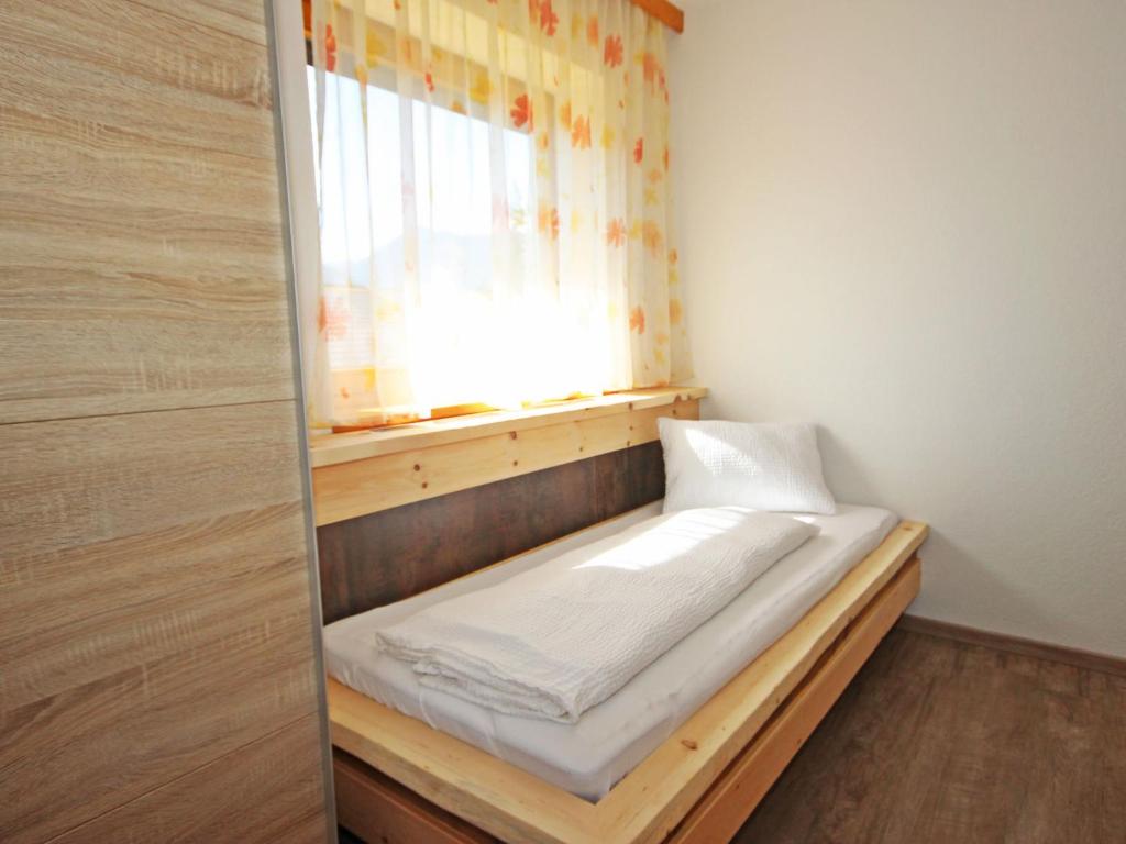 Postel nebo postele na pokoji v ubytování Apartment Haus Sailer by Interhome
