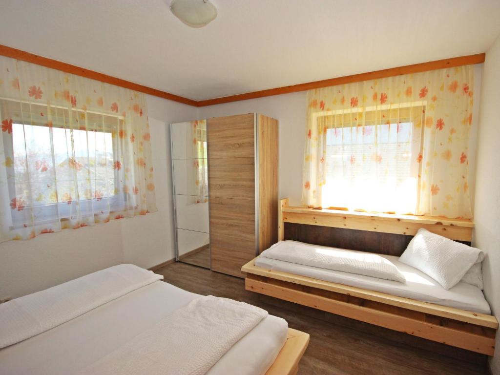 Postel nebo postele na pokoji v ubytování Apartment Haus Sailer by Interhome