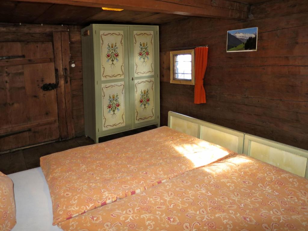 Postel nebo postele na pokoji v ubytování Chalet Lippnerhütte by Interhome