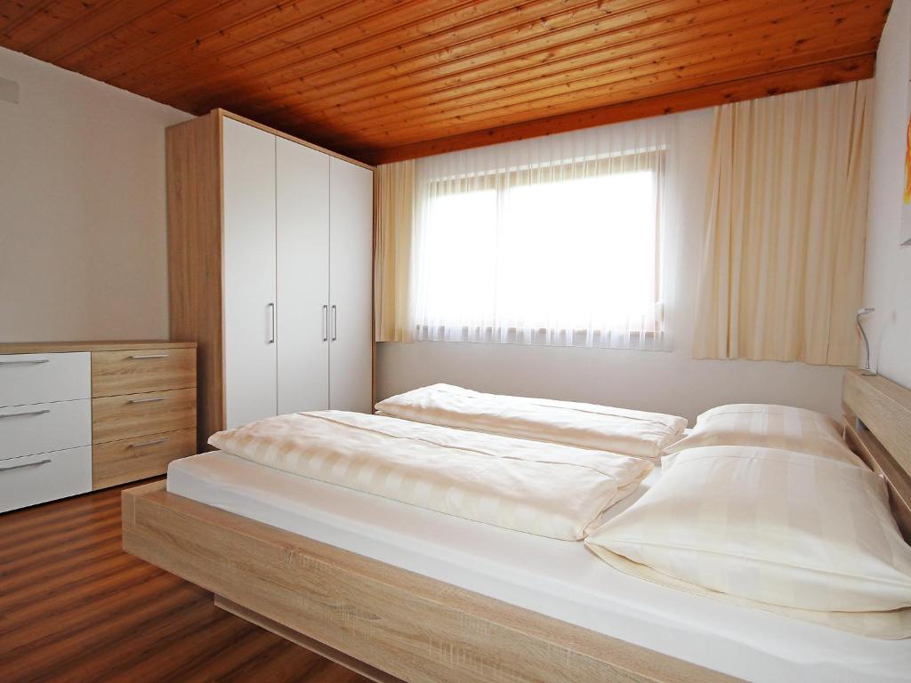 Posteľ alebo postele v izbe v ubytovaní Apartment Trummer by Interhome