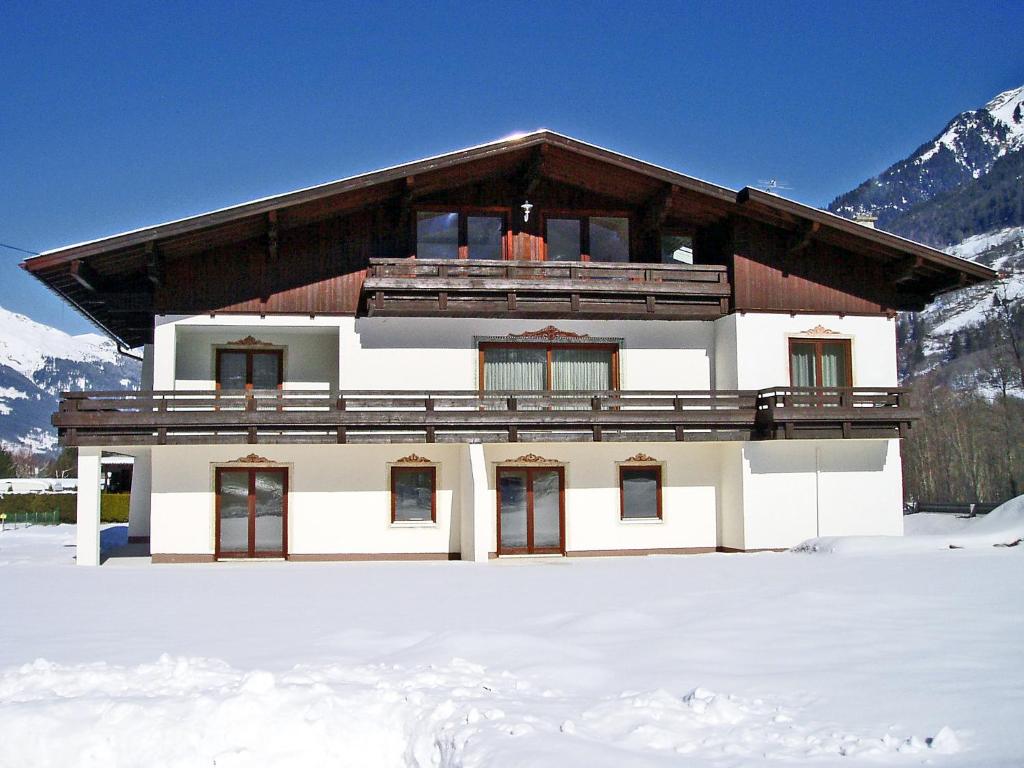 a building with snow in front of it at Apartment The Alpine Classic by Interhome in Badbruck