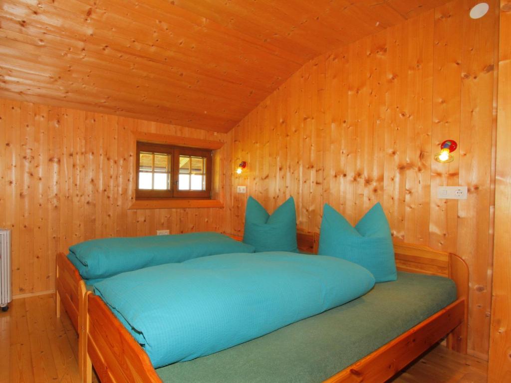 Postel nebo postele na pokoji v ubytování Chalet Auhäusl by Interhome