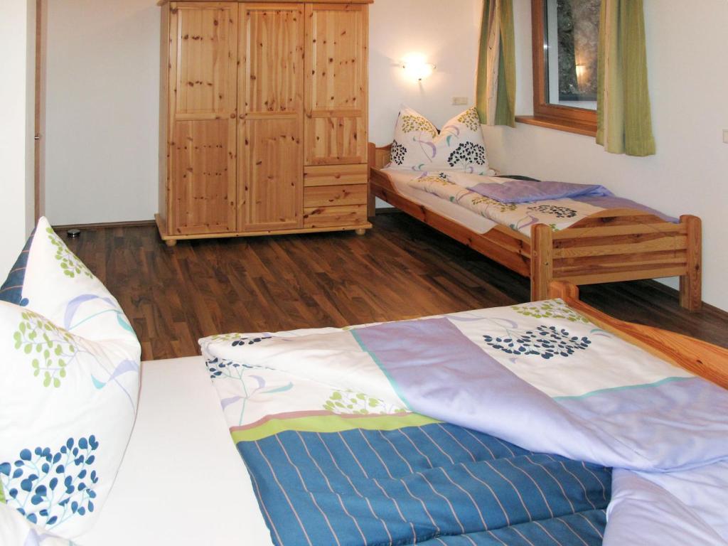 Postel nebo postele na pokoji v ubytování Apartment Edelweiss by Interhome
