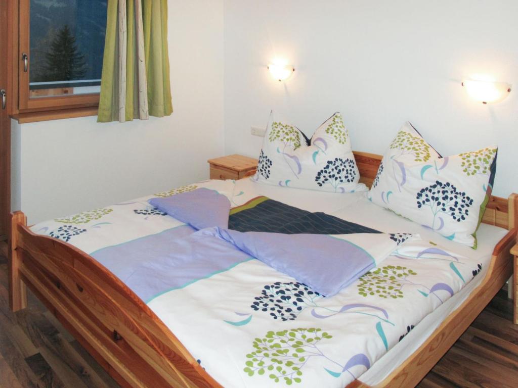 Postel nebo postele na pokoji v ubytování Apartment Edelweiss by Interhome