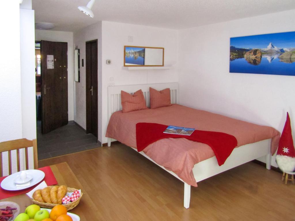 Postel nebo postele na pokoji v ubytování Apartment Sungold-2 by Interhome