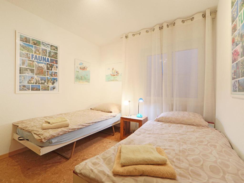 Postel nebo postele na pokoji v ubytování Apartment Bodmen A by Interhome