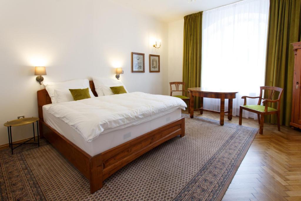 Postel nebo postele na pokoji v ubytování Parkhotel Vrbno