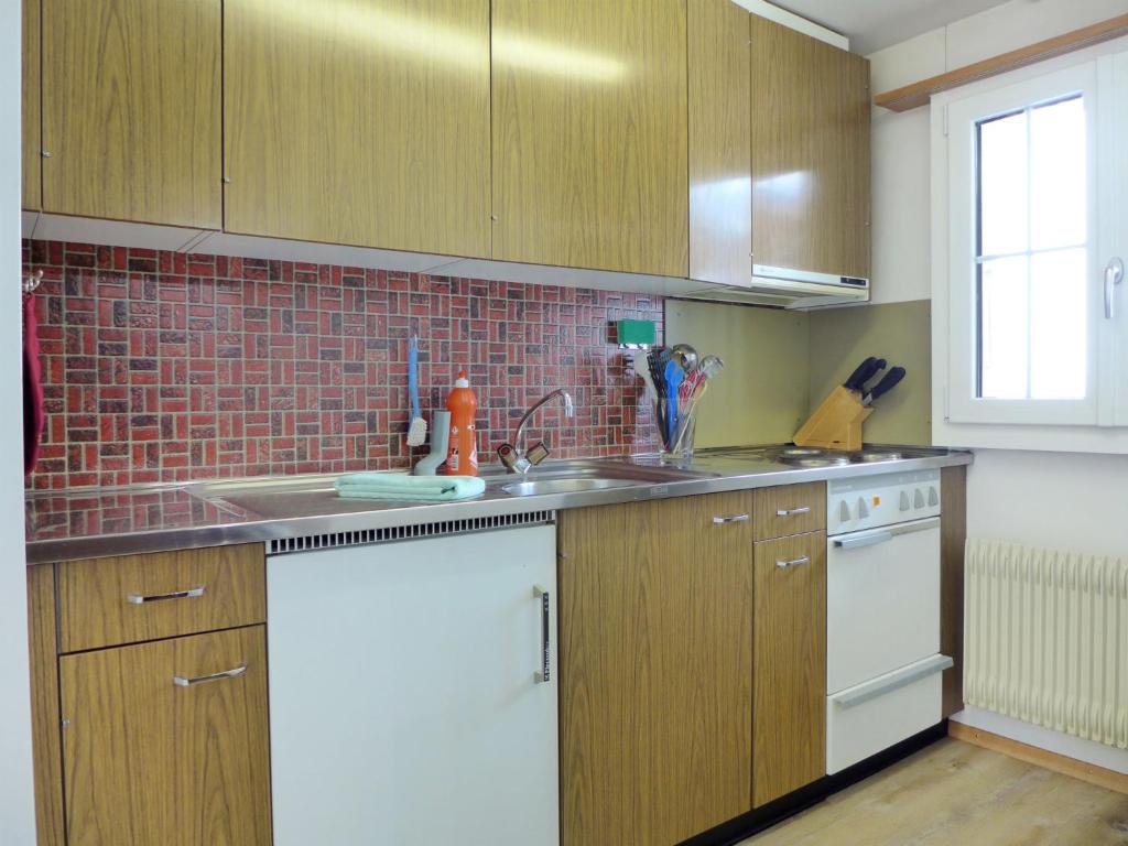 Η κουζίνα ή μικρή κουζίνα στο Apartment Chalet Seeberg by Interhome