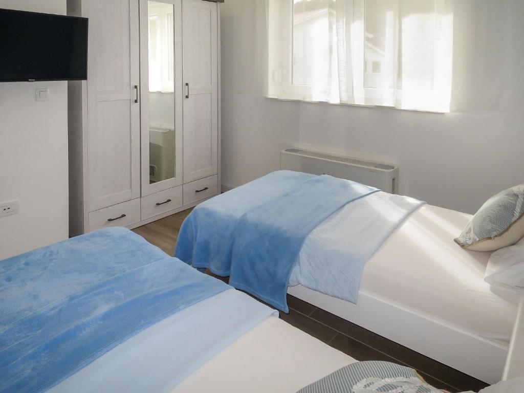 Posteľ alebo postele v izbe v ubytovaní Holiday Home Lucija by Interhome