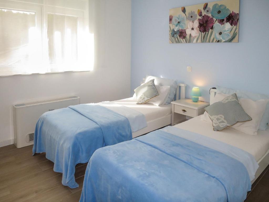 Posteľ alebo postele v izbe v ubytovaní Holiday Home Lucija by Interhome