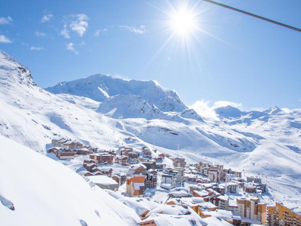 a town in the snow on a snowy mountain at Apartment Le Roc de Peclet by Interhome in Val Thorens