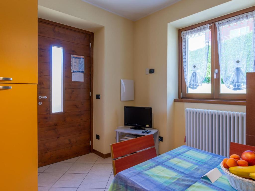 TV a/nebo společenská místnost v ubytování Holiday Home Elisa by Interhome