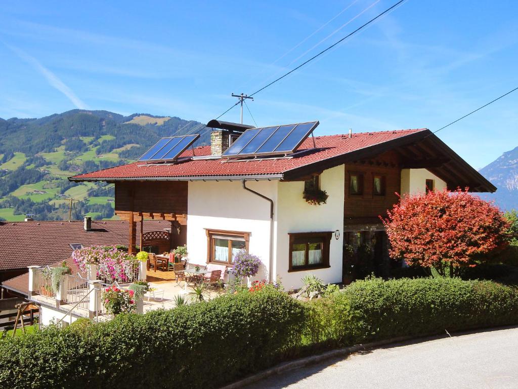 a house with solar panels on top of it at Apartment Michaela by Interhome in Hart im Zillertal