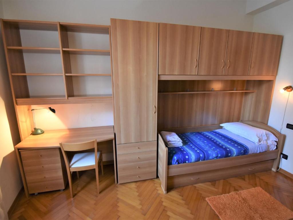 Łóżko lub łóżka w pokoju w obiekcie Apartment Al Foghèr by Interhome