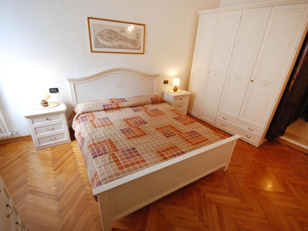 Łóżko lub łóżka w pokoju w obiekcie Apartment Al Foghèr by Interhome