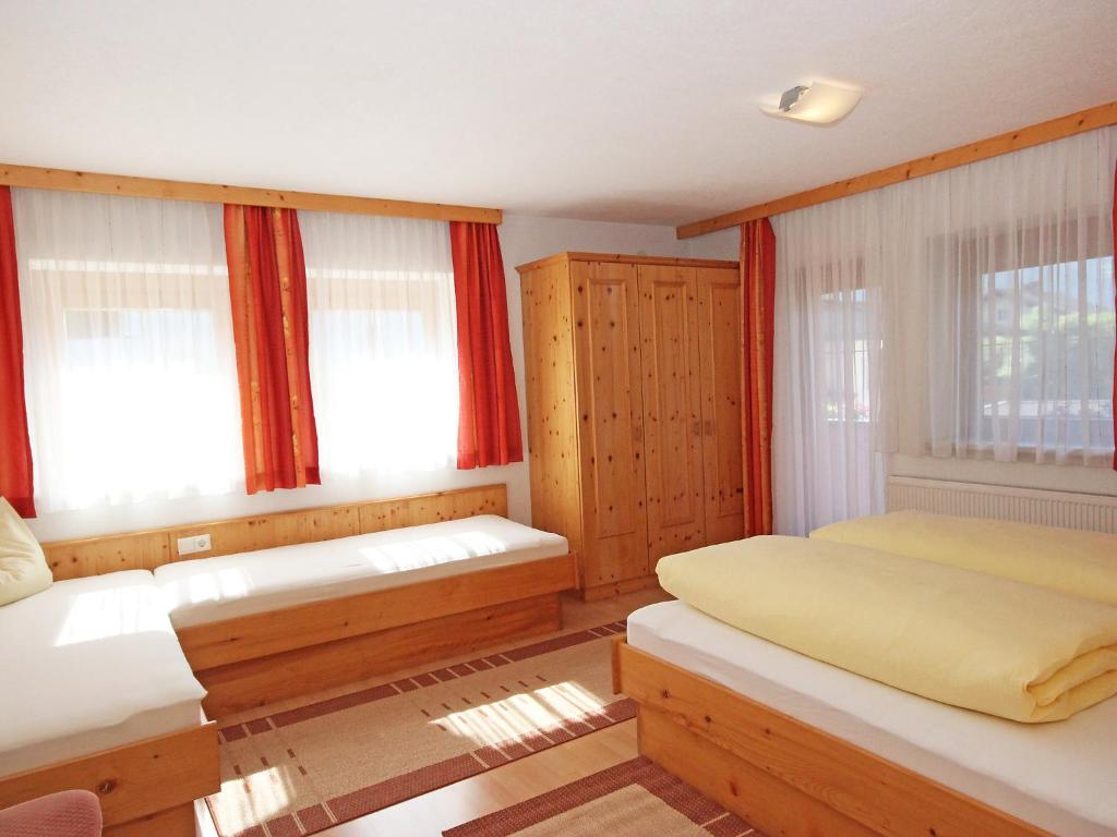 Postel nebo postele na pokoji v ubytování Apartment Marina by Interhome