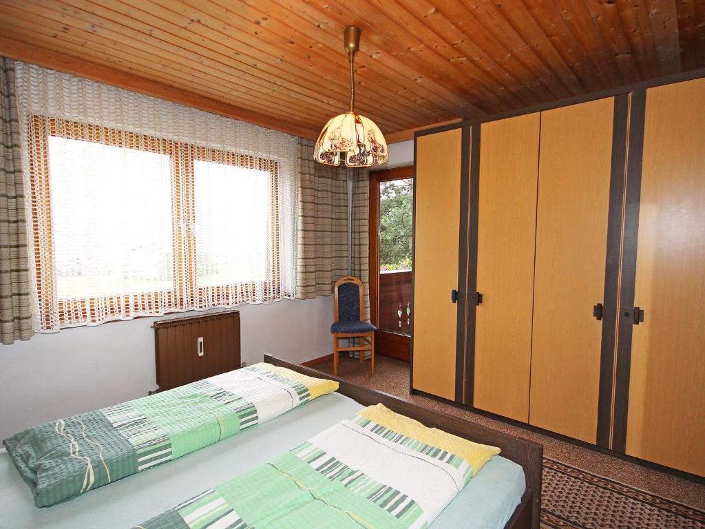 Postel nebo postele na pokoji v ubytování Holiday Home Hussl by Interhome