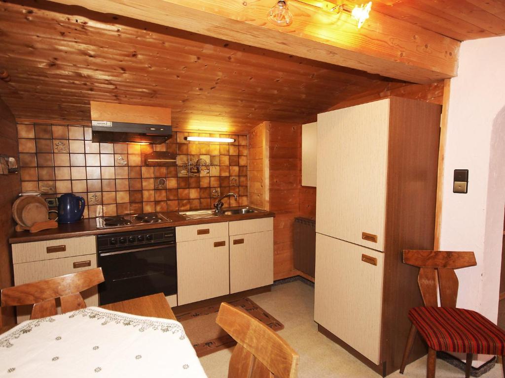 Kuchyň nebo kuchyňský kout v ubytování Holiday Home Hussl by Interhome