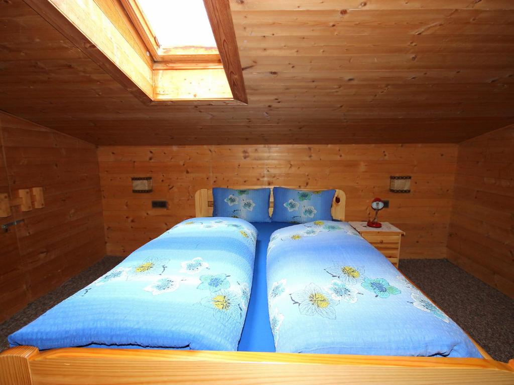Postel nebo postele na pokoji v ubytování Holiday Home Hussl by Interhome