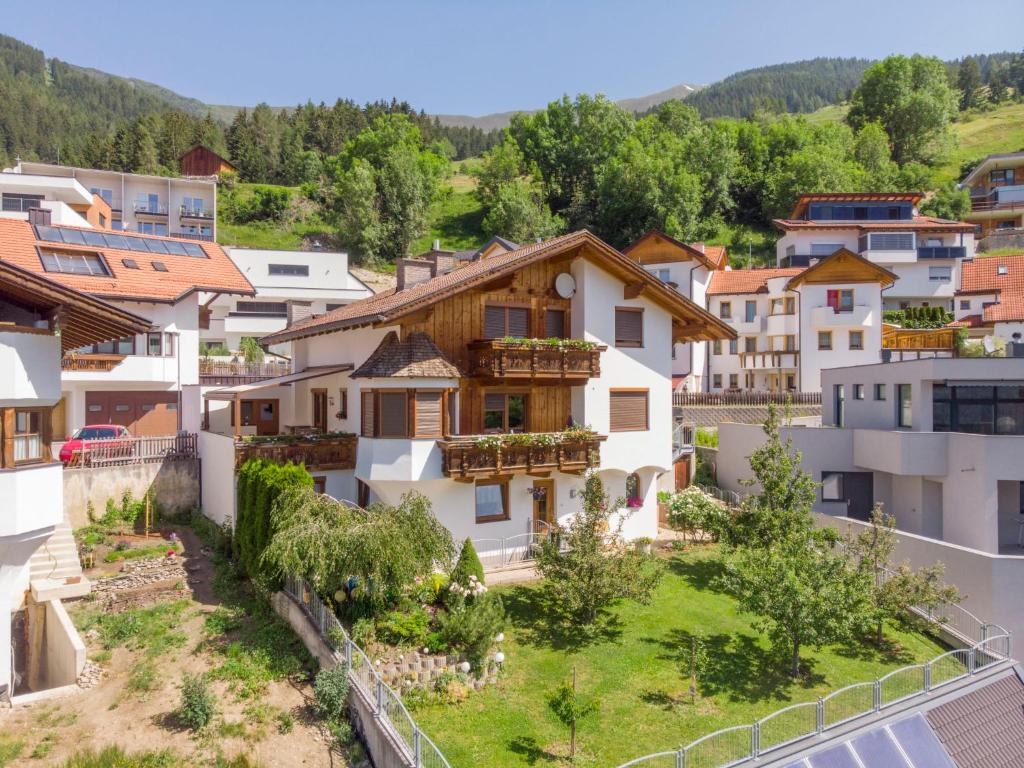 a village in the mountains with houses at Apartment Evi by Interhome in Fliess