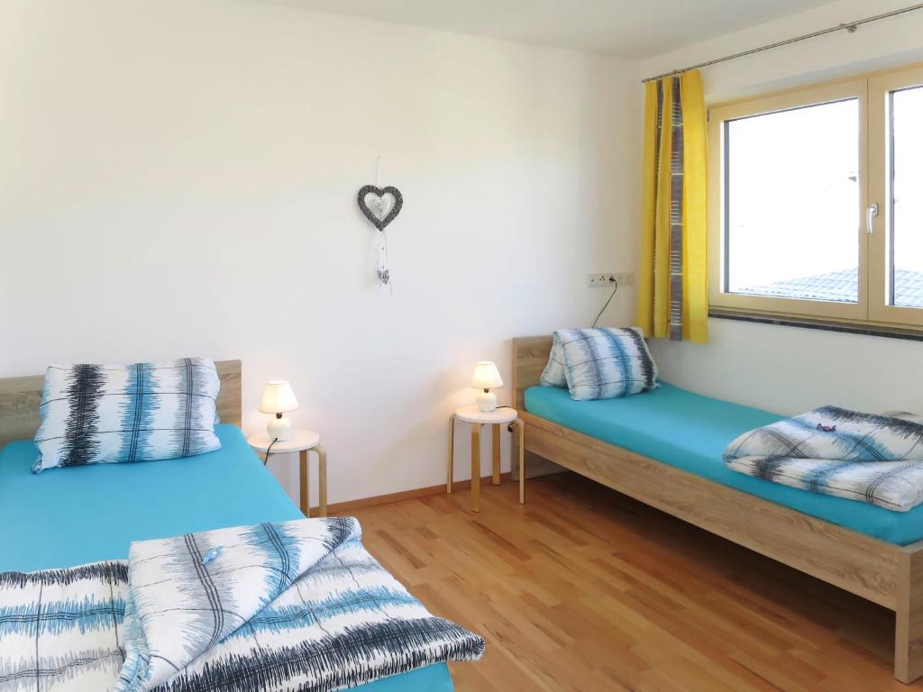 Postel nebo postele na pokoji v ubytování Apartment Zillertalblick by Interhome