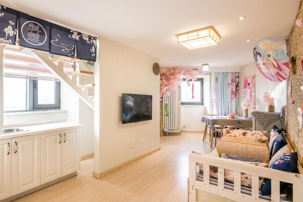 TV a/nebo společenská místnost v ubytování Yu Jing Xuan Boutique Apartment
