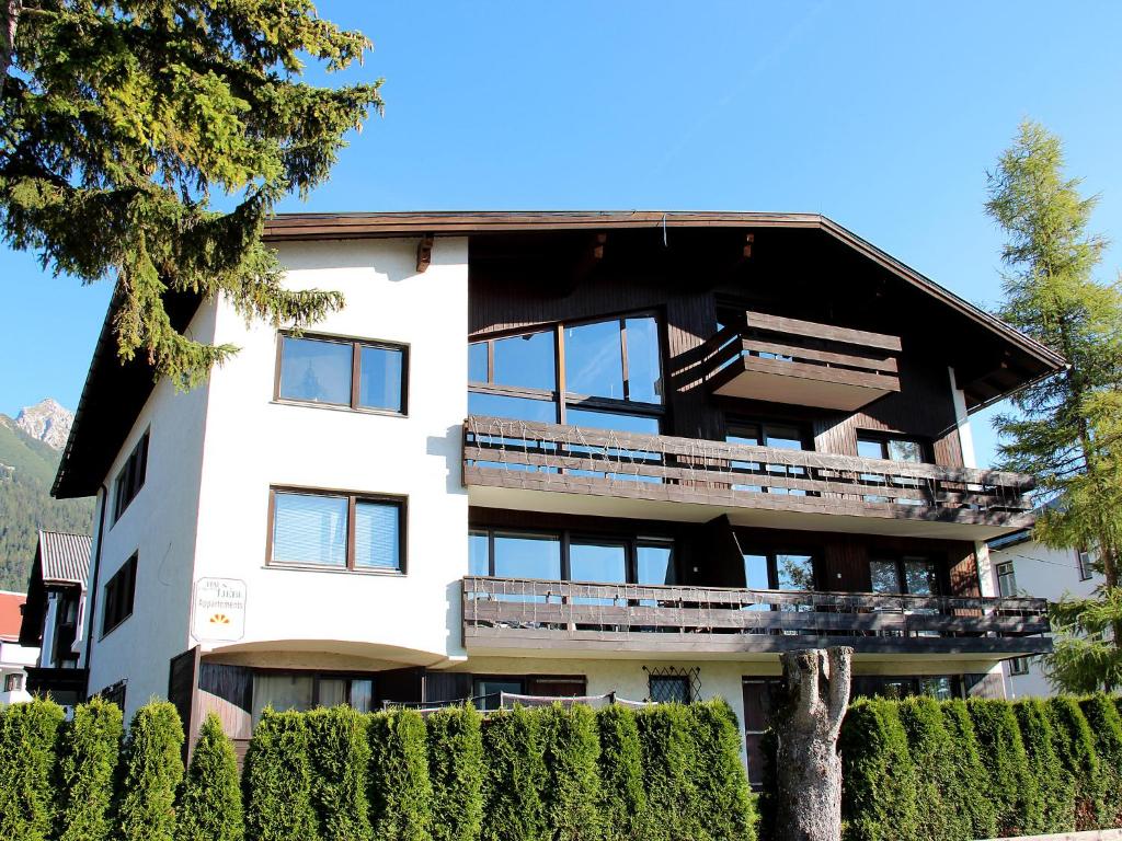 a large white building with a balcony at Apartment Liebl-1 by Interhome in Seefeld in Tirol