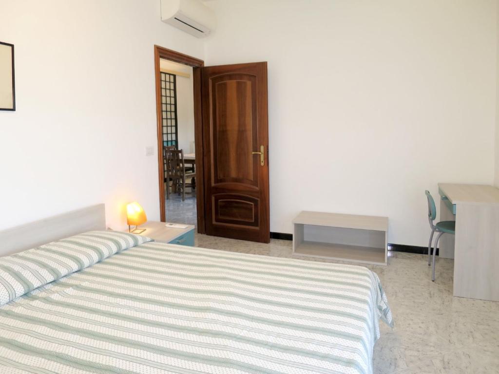 Posteľ alebo postele v izbe v ubytovaní Apartment Orizzonte by Interhome