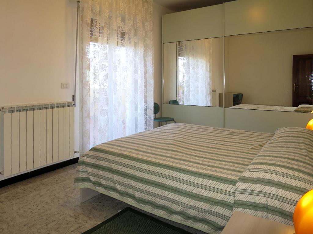 Posteľ alebo postele v izbe v ubytovaní Apartment Orizzonte by Interhome